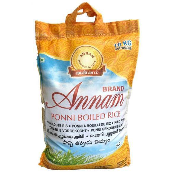 Packaging of Annam Ponni Boiled Rice, 10Kg, predominantly yellow and green with branding and product name displayed.