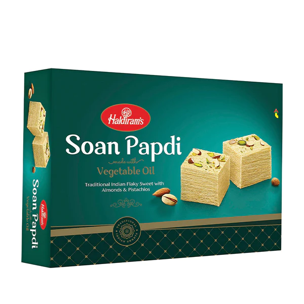 Box of Haldiram's Soan Papdi Cubes, a traditional Indian sweet, with the product visible on the front.