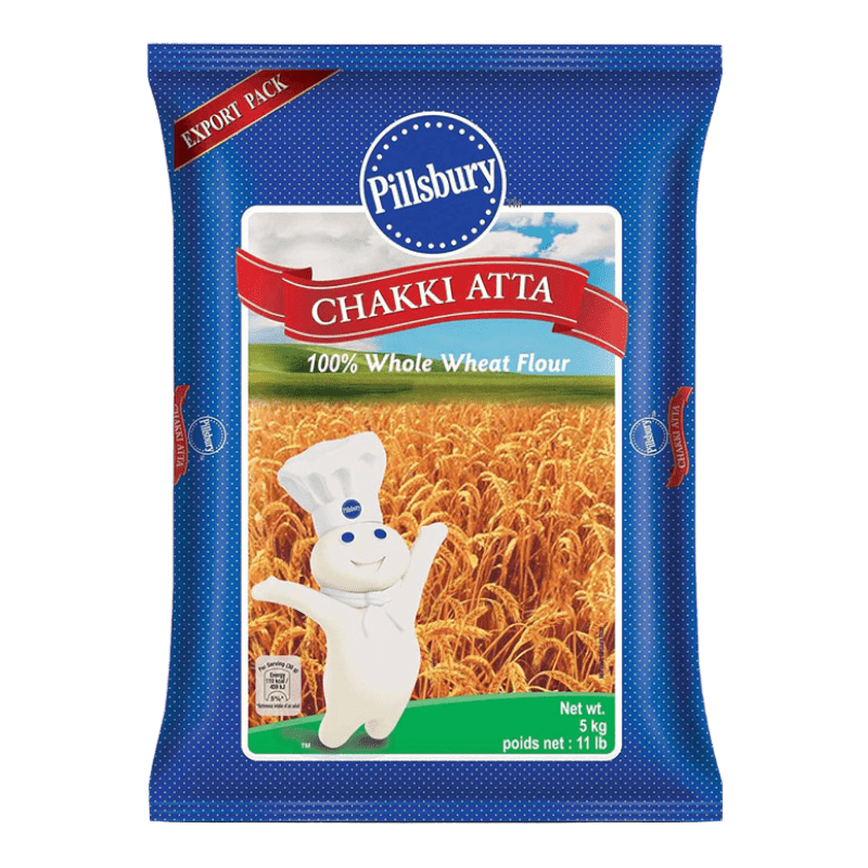 A package of Pillsbury Chakki Atta 100% Whole Wheat Flour, 5kg, with a blue color scheme and an illustration of a character on the front.