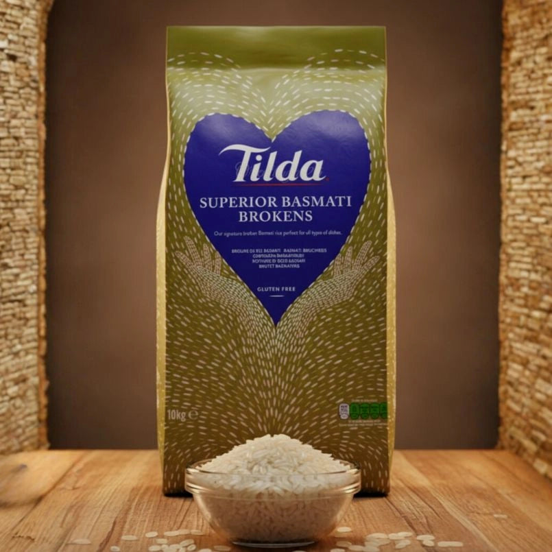 Tilda Superior Basmati Broken rice package with a bowl of rice on a wooden surface.