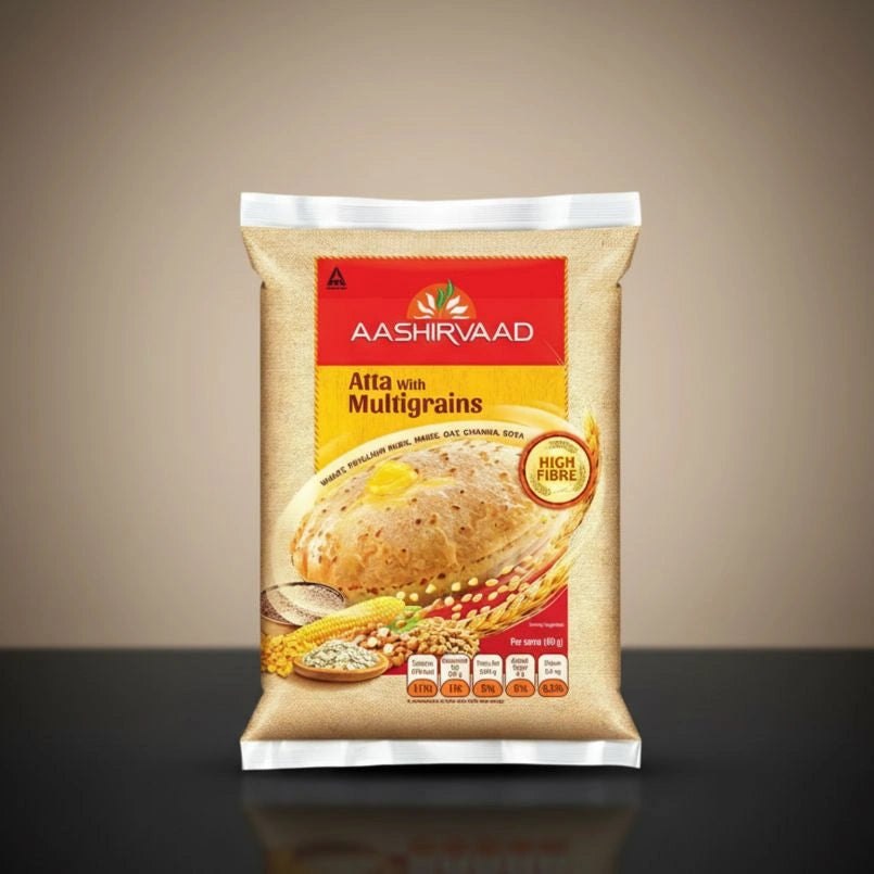 Aashirvaad Atta with Multigrains packaging on a gradient background