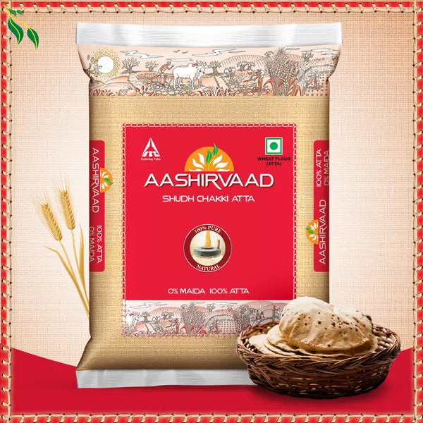 Aashirvaad Whole Wheat Atta packaging with a depiction of wheat and roti, indicating the product is a type of flour, likely used for baking.