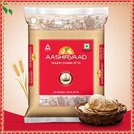 Aashirvaad Whole Wheat Atta packaging with a depiction of wheat and roti, indicating the product is a type of flour, likely used for baking.