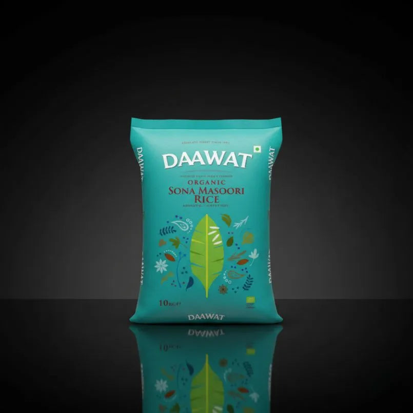 DAAWAT organic Sona Masoori Rice package on a reflective black surface with a dark background