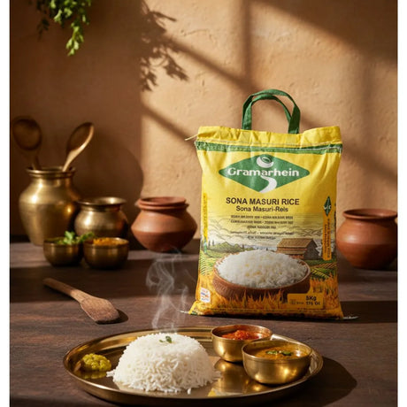 Gramarheim Sona Masuri Rice bag with a plate of rice and curry on a wooden table.