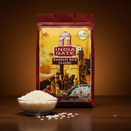 India Gate Basmati Rice Classic packaging with a bowl of rice on a wooden surface
