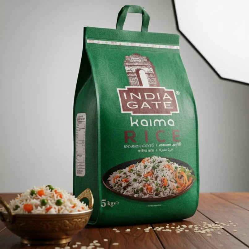 Green bag of India Gate Kaima Rice with a bowl of rice on a wooden surface
